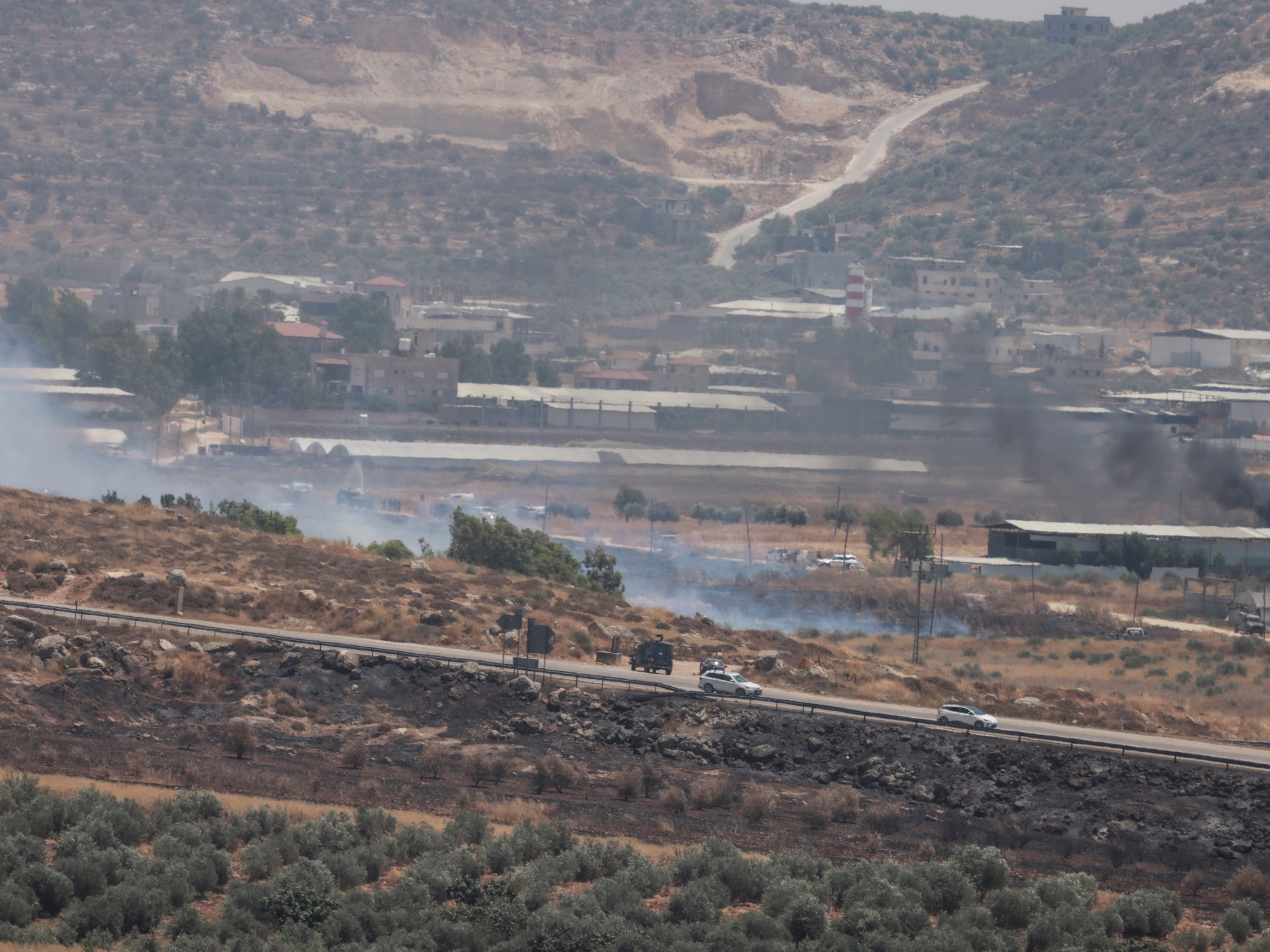 Read more about the article Two Palestinians shot dead by Israeli forces as West Bank fields set ablaze