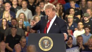 Read more about the article Trump calls protester ‘communist’ after Michigan speech interruption | Donald Trump